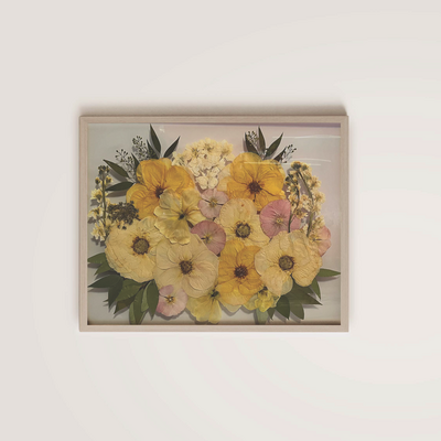 Archive Floral Preservation. Red and yellow pressed floral frame.