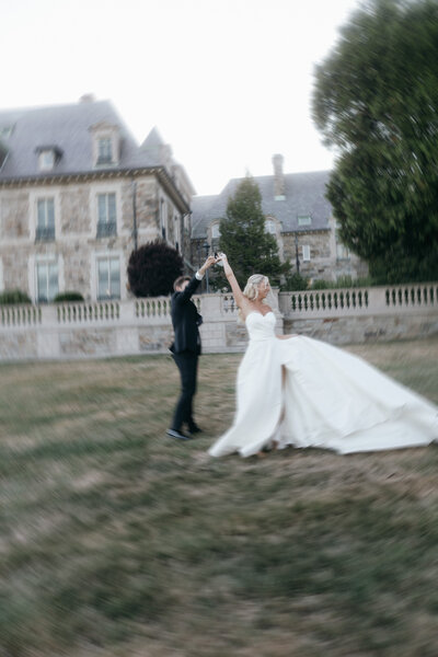 Poetic editorial photo of a wedding couple at a historic luxury venue.
