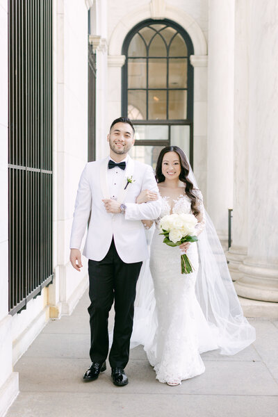 romantic-bride-groom-walk-downtown-club-philadelphia