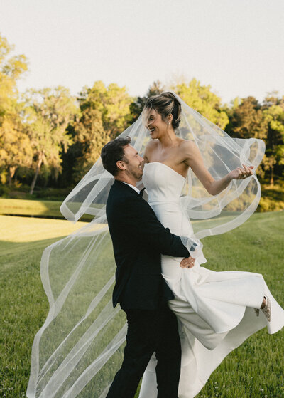 bride and groom embracing