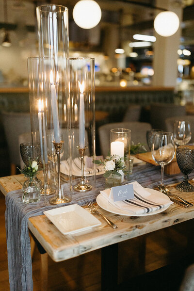 Outdoor wedding ceremony with stained glass backdrop at the Gathered in Calgary