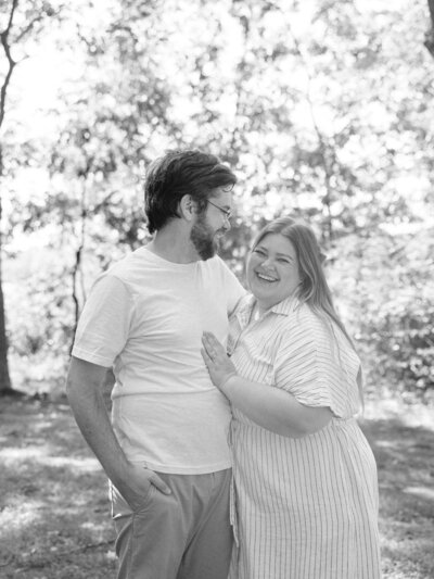 Shalae and Michael laughing together in black and white picture