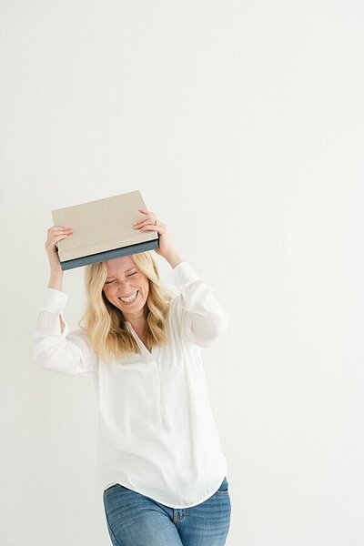 Louisville Ky newborn photographer, Julie Brock, has fun taking her own branding headshots