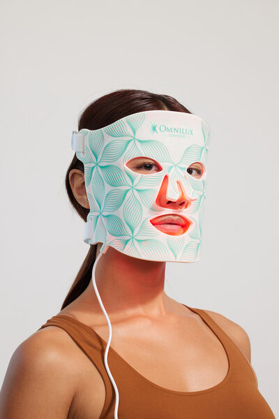 Omnilux LED Contour Face Mask uses red light therapy to treat fine lines & wrinkles, redness and pigmentation