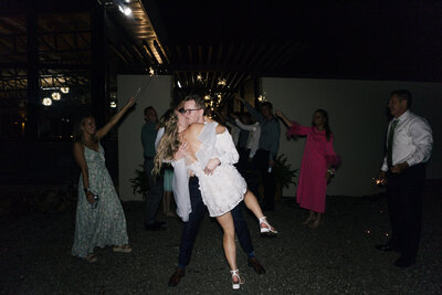 Tattooed couple during their alternative micro-wedding in Springfield, MO, photographed by Chelsea Stanford at Gillioz Theatre
