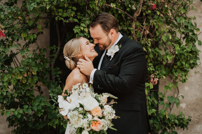 bride and groom looking at each other