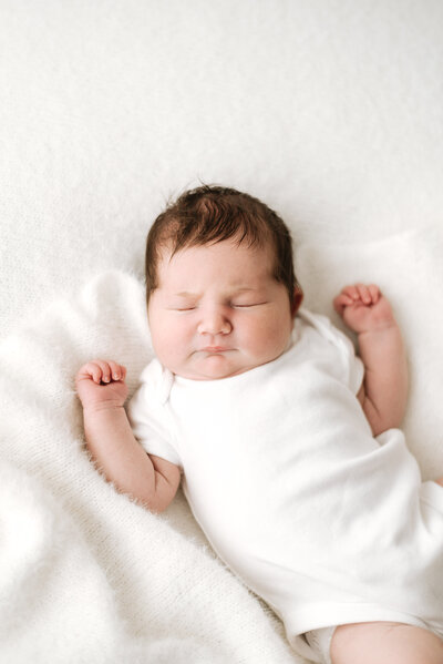 Newborn baby sleeping at Billingshurst photoshoot