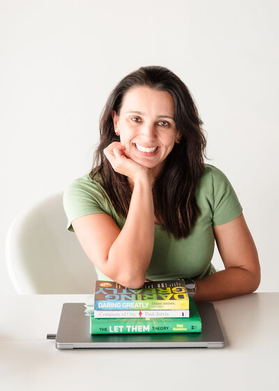 photo of the brand photographer holding her  favorite  books