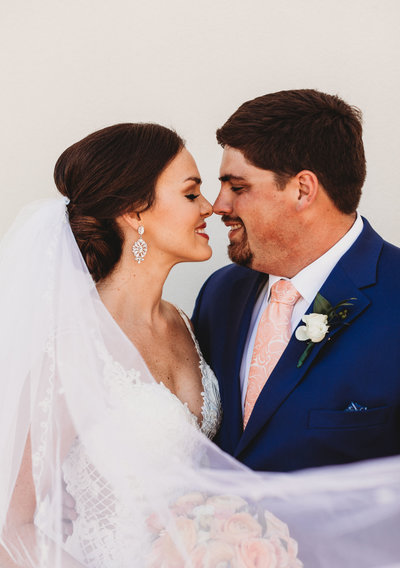couple kissing on their wedding day in columbus georgia