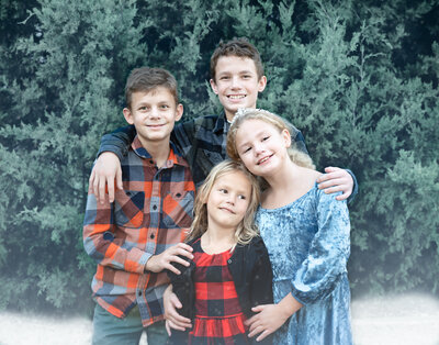 Small family portrait with fog and cedar trees in McKinney, TX.