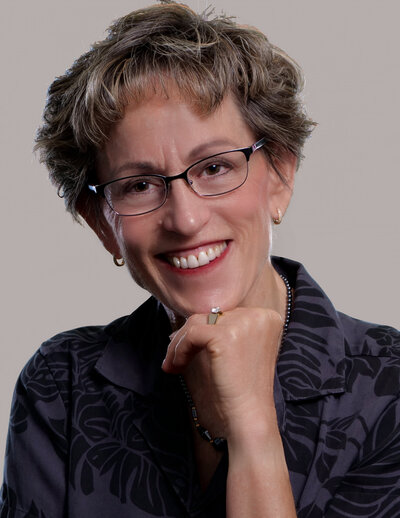 Photographer, Judy Cirullo, smiles for headshot