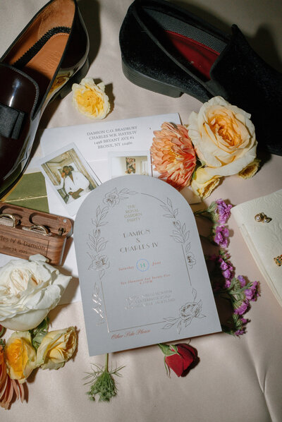 wedding details laid out on the floor