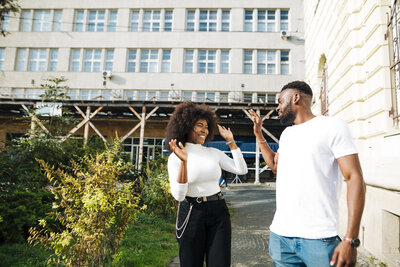 smiley-intercultural-friends-walking-together