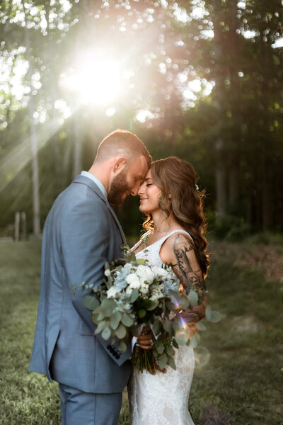 Salem VA wedding and Elopement photographer earthy and moody Charleigh Roberts Photography artsy earthy moody virginia roanoke va east coast north carolina nc pearl veil babys breath kiss happy blue ridge mountains parkway