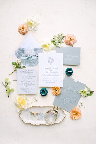 flat lay design of an invitation suite at a glen manor house wedding in portsmouth rhode island