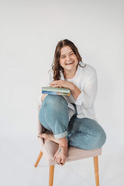 Photo of Rebecca Wrights author laughing and posing for camera