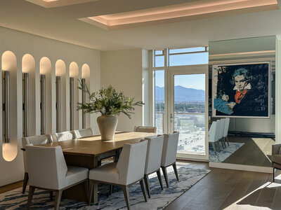 Warm, luxurious, and modern dining room design by Sister Studio Interior Design in Utah