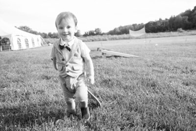 Black and white photo of a child at Charlotte's Bat Mitzvah at Temple Emanuel in Newton, MA.