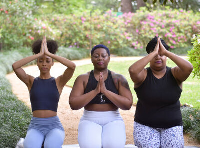 Three back women doing yoga poses