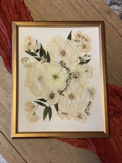 Close-up of preserved wedding flowers by Leigh Florist, highlighting intricate floral preservation details.