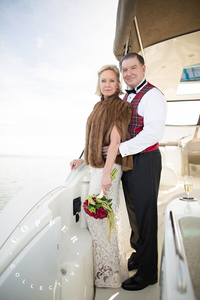 Bride, groom and family on boat at San Diego Elopement