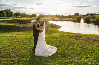 Wedding couple sharing a romantic gaze.