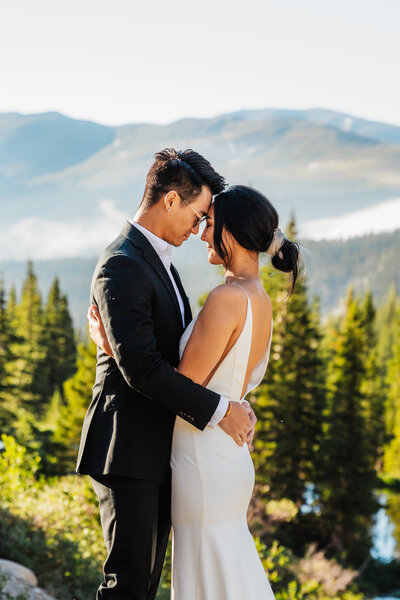 a couple with the mountains in the background orlando wedding and elopement photographer - shannon lee photography