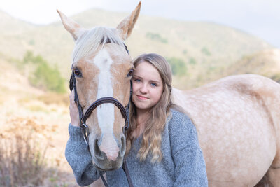teen girl with her horse