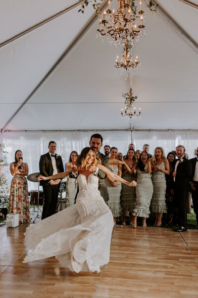 newlyweds dancing at reception