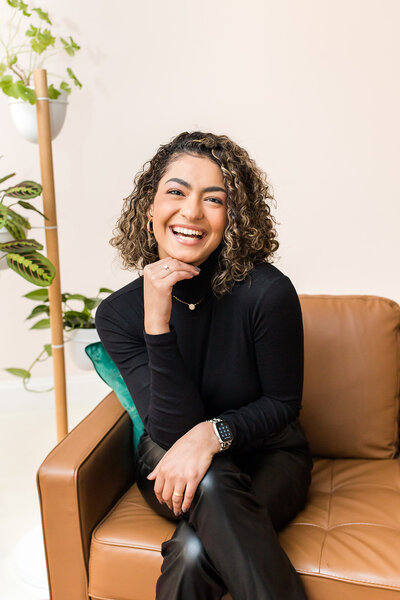 maine salon staff sitting on couch in salon and spa