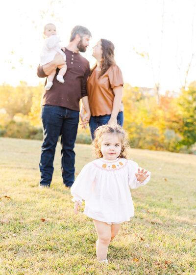 Romantic portrait of Julianna and Josh near a chapel, showcasing timeless love by Abby Bell Photography in Alabama.