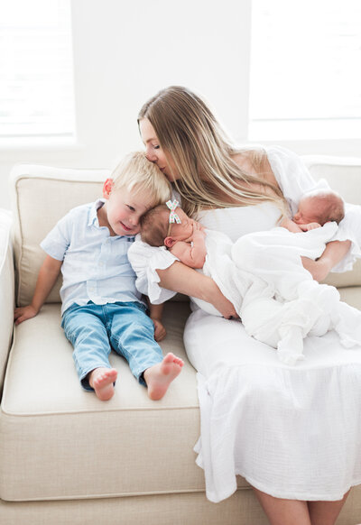 In-home newborn session with older siblings in Golden, Colorado