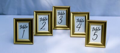 table numebrs gold frame for rent
