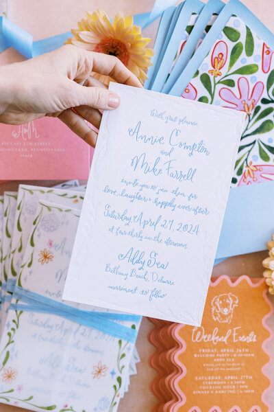 Beautiful blush and peach wedding invitation set with custom calligraphy by Lewes Lettering Co