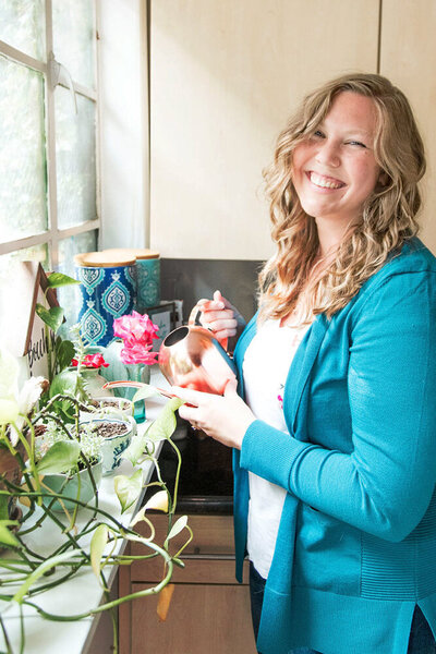 Julia Bocchese of Julia Renee Consulting watering plants