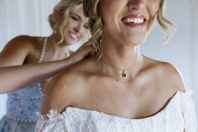Bride and Maid of Honor getting ready for ceremony at Willstone Acres wedding venue