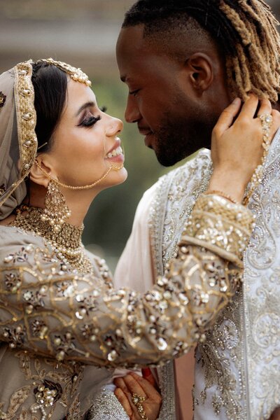 Couple-looking-into-their-eyes-kissing-eachother-during-their-wedding-photography-in-pergola-and-hill-garden-Hampstead-0005-Hadi-Photography