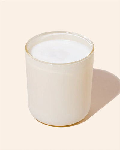 Noura Blanc Aura Candle in Cream Large 12oz on Flat Lay
