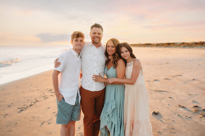 Family poses for Family Portraits on Isle of Palms.