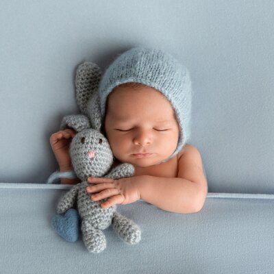 Newborn cuddles teddy photography NC