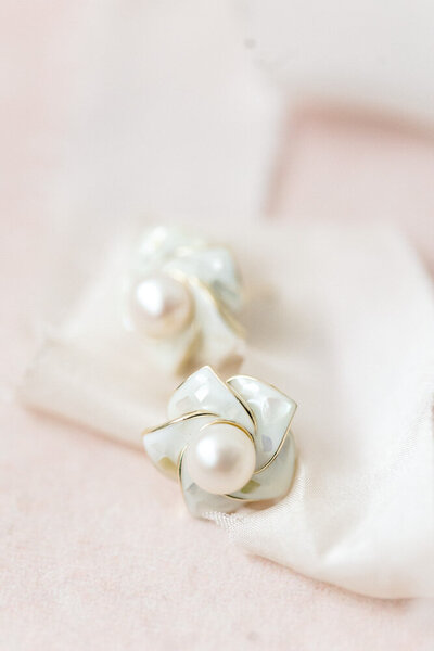 Atlanta Photographer Bridal Portraits | Pearl earrings on a pink silk ribbon