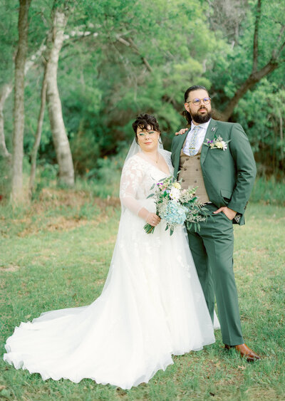 bride and groom looking off into the distance