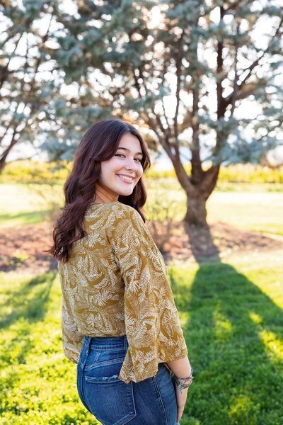 pretty girl in white dress at sunset