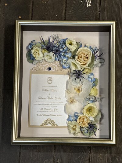 Unique floral preservation piece capturing the beauty of fresh blooms, created by Leigh Florist floral design studio.
