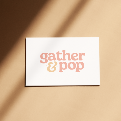 Gather & Pop business bard mockup on a tan background