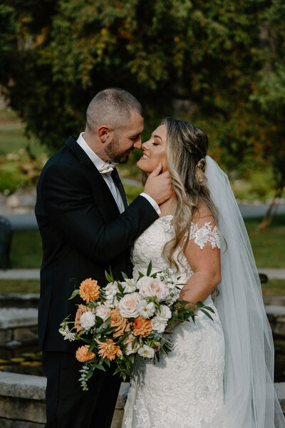 couple embracing with flowers