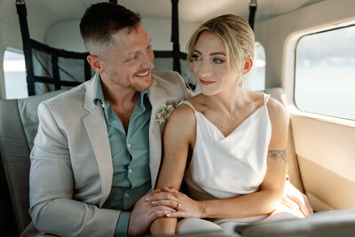 Bride & Groom enjoying the views from a float plane in PNW