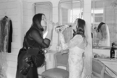 Heather Thompson, Dallas-based wedding photographer, specializing in luxury and fine art wedding photography. Captured in a classic black-and-white portrait.
