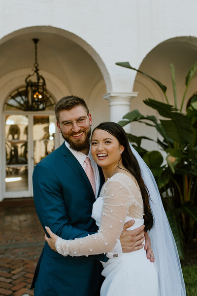 Husband Wife smile at Crane Cottage Jekyll Island