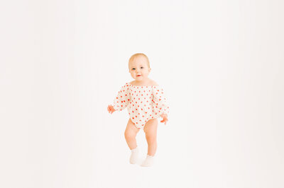 baby girl walking in Springfield MO kids photography session